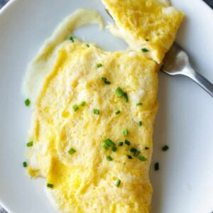 Fluffy omelette filled with melted cheese