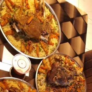 "Half roasted lamb, selected lamb pieces marinated and slow-cooked"