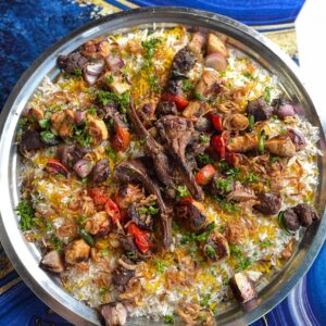 "Mixed Grill for 3 people - selection of grilled meats and sides for a shared meal"